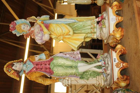 Pair tall Italian painted pottery figures